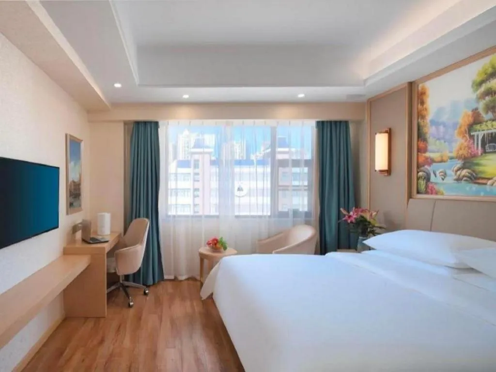 Bed in Vienna Hotel Kunming Baiyun Road Metro Station Jiang'an