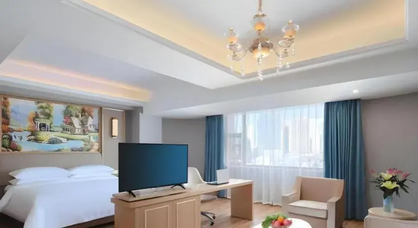 Bed in Vienna Hotel Kunming Baiyun Road Metro Station Jiang'an Bed in Vienna Hotel Kunming Baiyun Road Metro Station Jiang'an