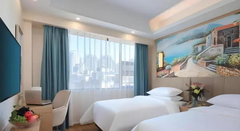 Bed in Vienna Hotel Kunming Baiyun Road Metro Station Jiang'an Bed in Vienna Hotel Kunming Baiyun Road Metro Station Jiang'an