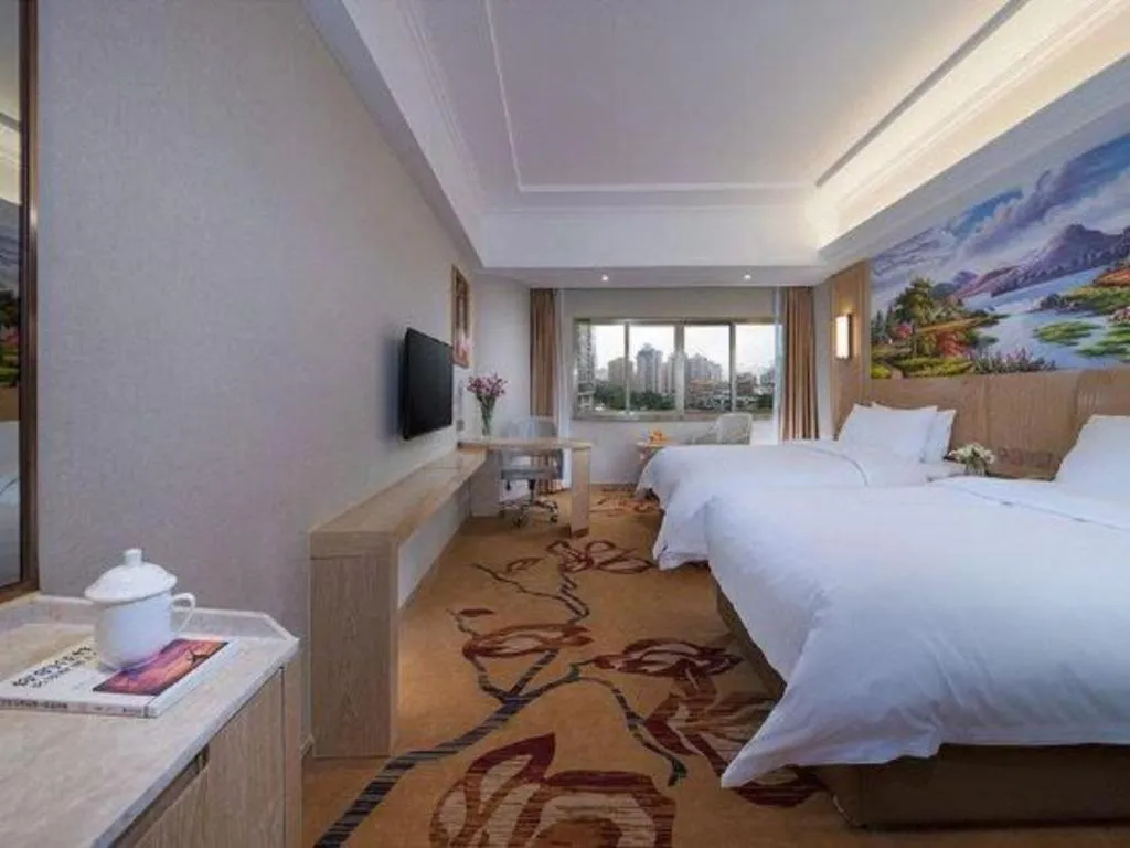 Bed in Vienna Hotel Chongqing Jiangjin Shuangfu