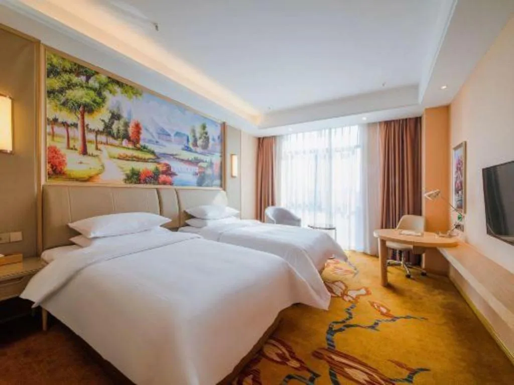 Bed in Vienna Hotel Chongqing Jiangjin Shuangfu