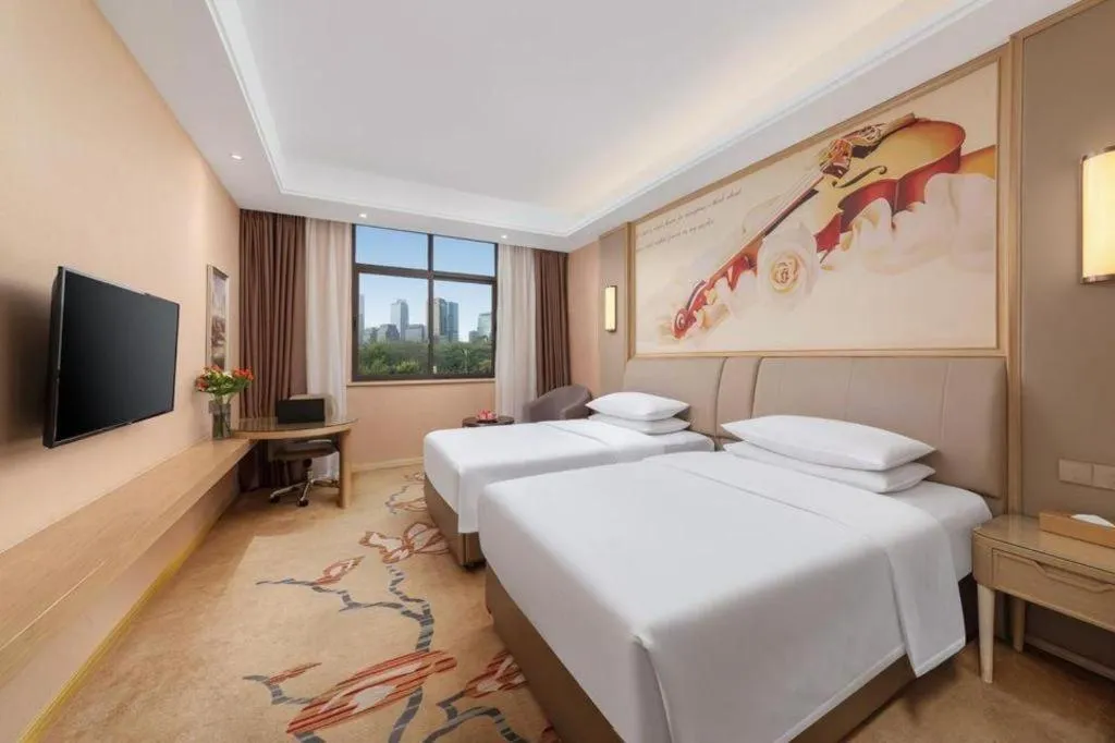 Bed in Vienna Hotel Chongqing Jiangjin Shuangfu