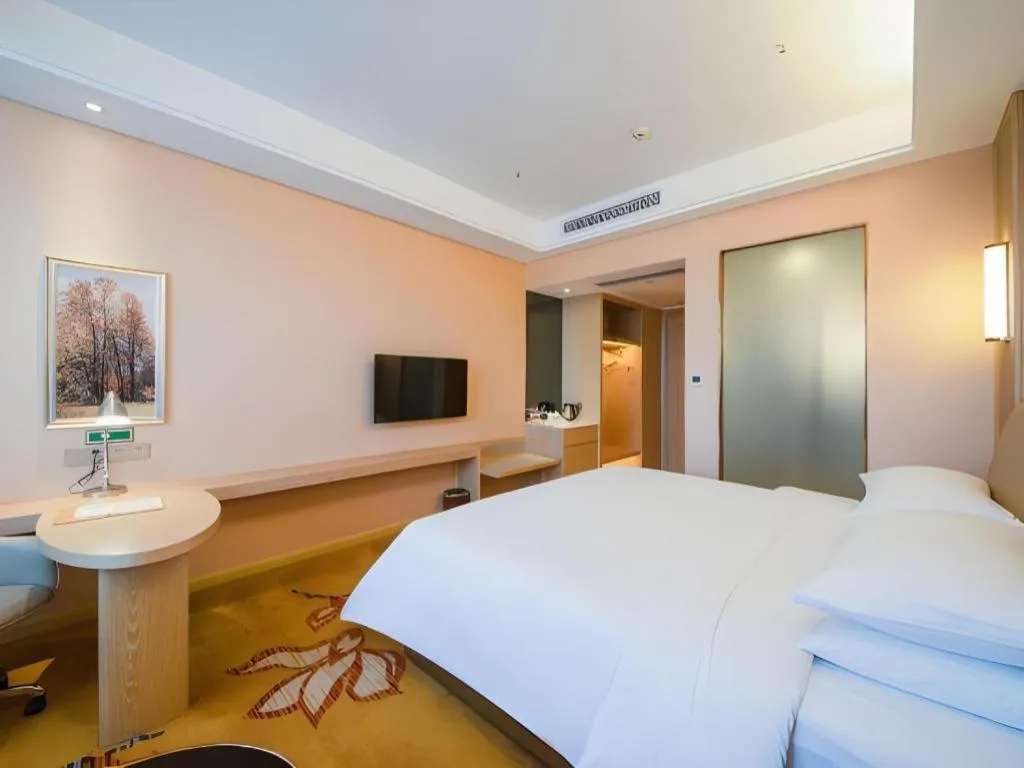 Bed in Vienna Hotel Chongqing Jiangjin Shuangfu