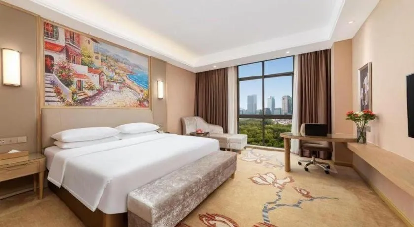 Bed in Vienna Hotel Chongqing Jiangjin Shuangfu