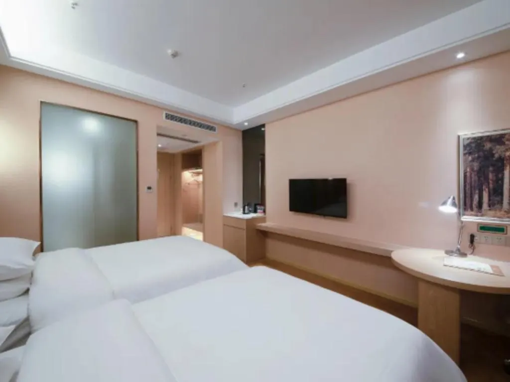 Bed in Vienna Hotel Chongqing Jiangjin Shuangfu