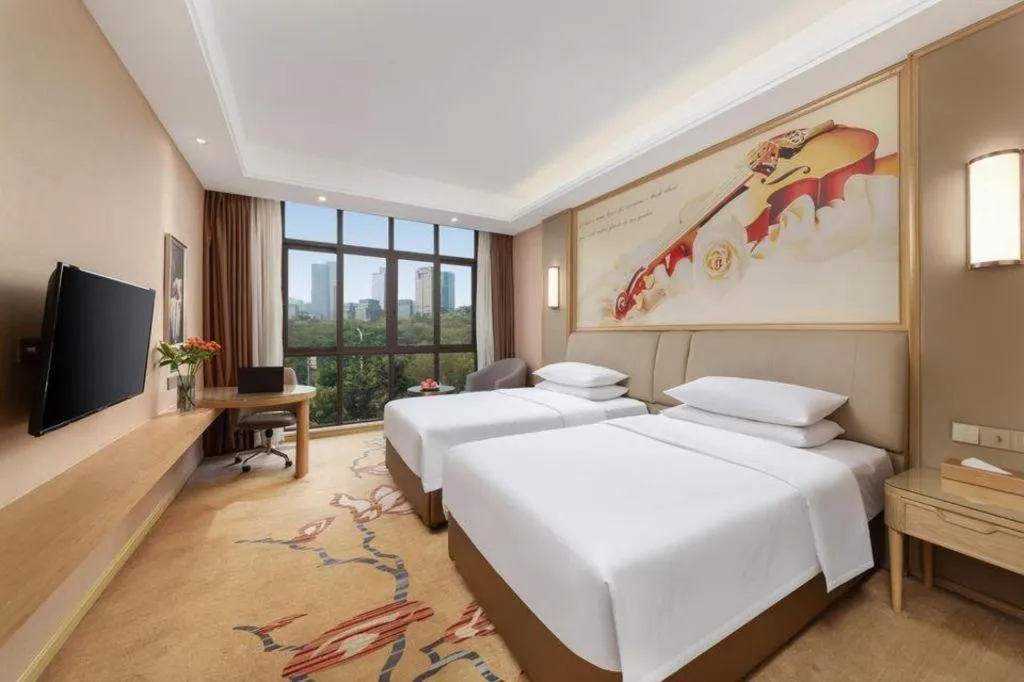 Bed in Vienna Hotel Chongqing Jiangjin Shuangfu