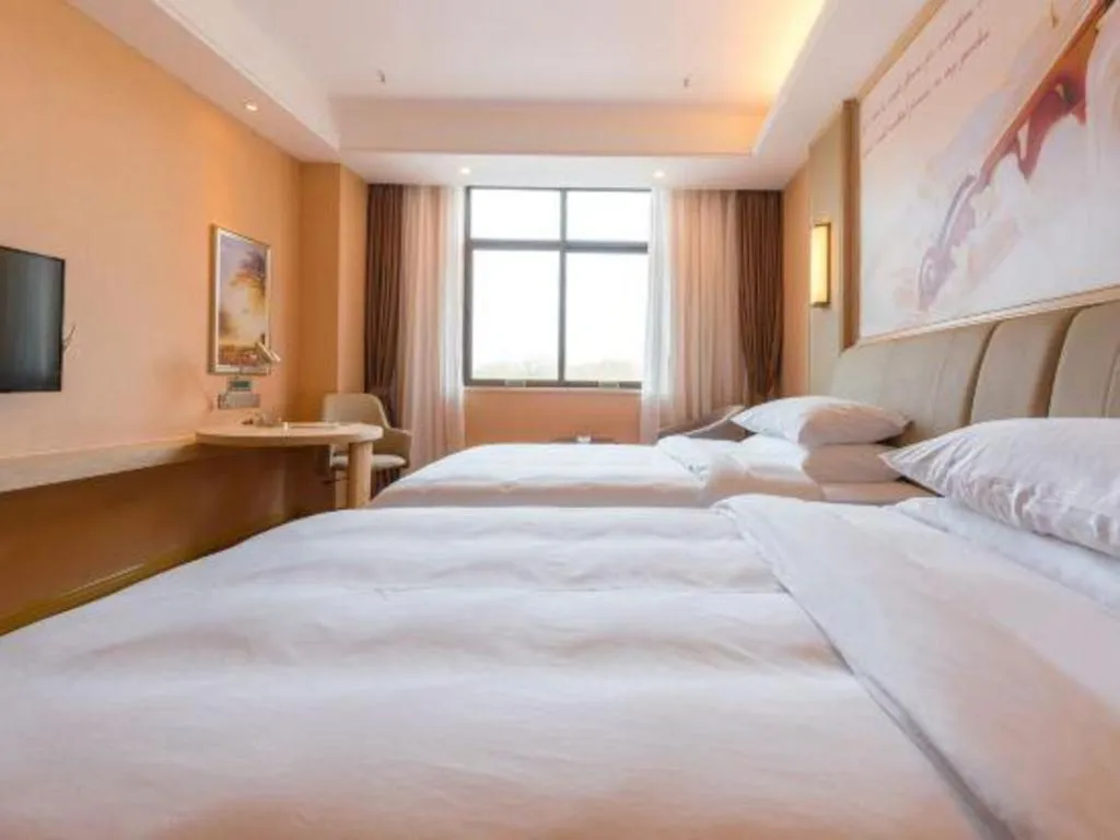 Bed in Vienna Hotel Chongqing Jiangjin Shuangfu