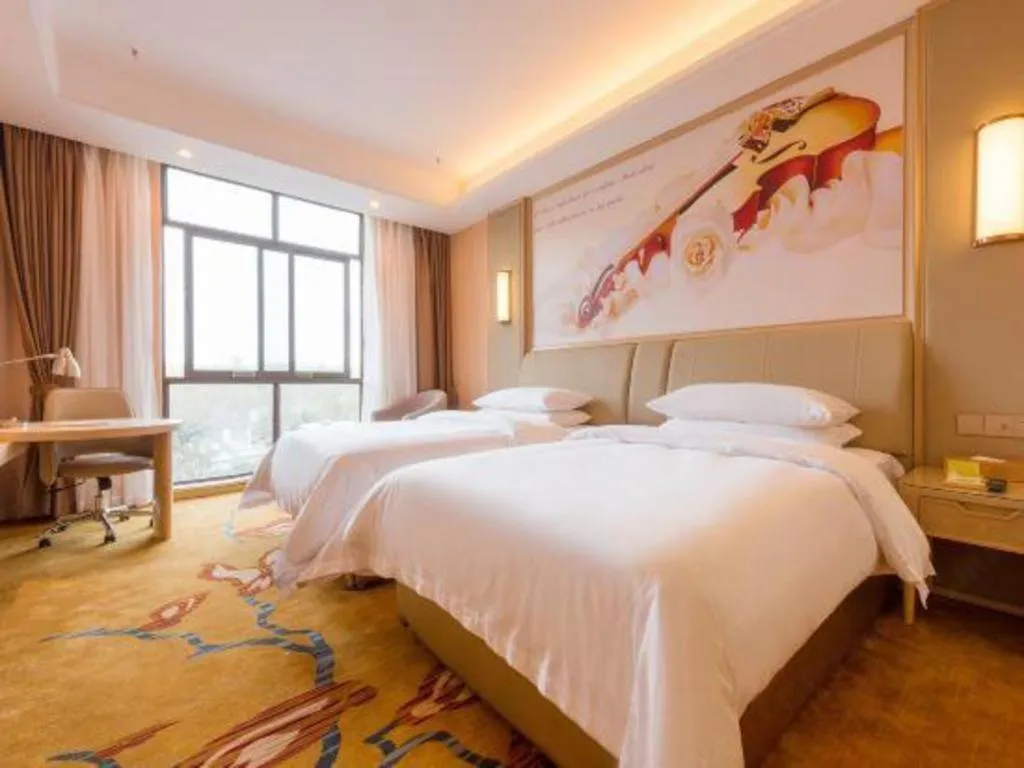 Bed in Vienna Hotel Chongqing Jiangjin Shuangfu