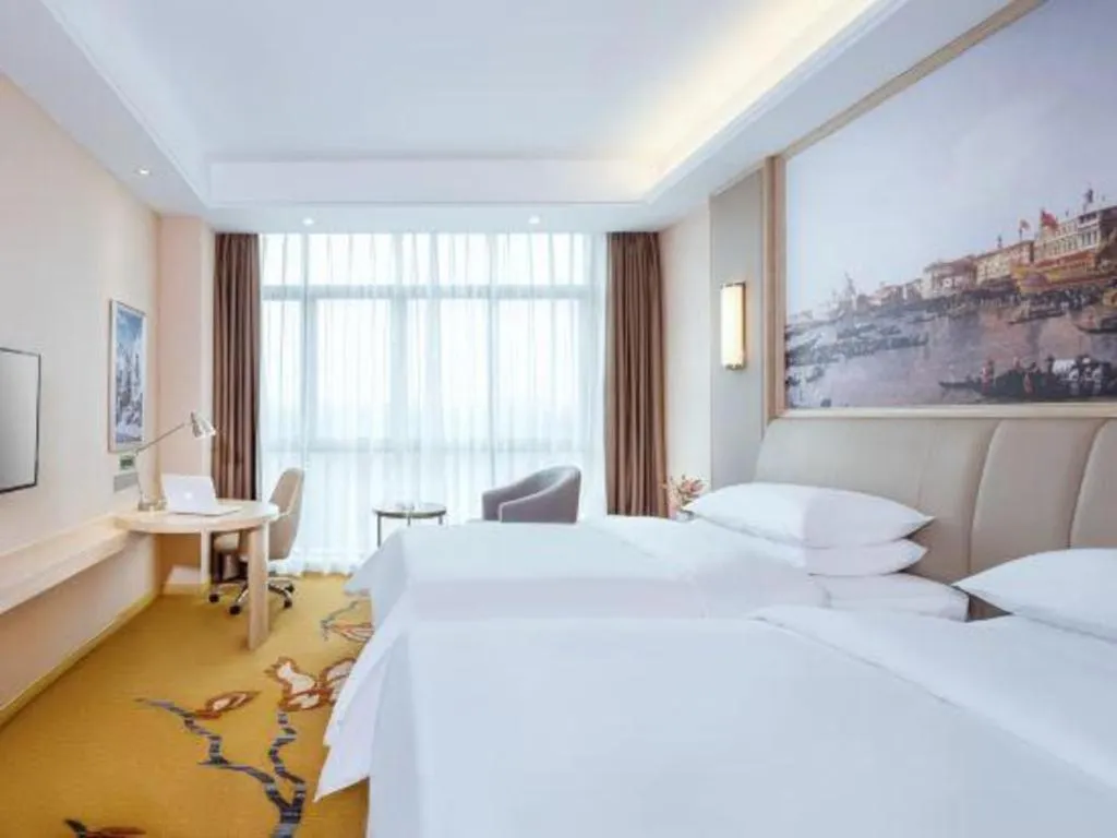 Bed in Vienna Hotel Chongqing Jiangjin Shuangfu