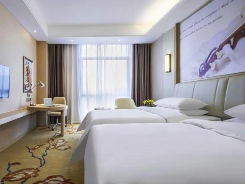 Bed in Vienna Hotel Chongqing Jiangjin Shuangfu