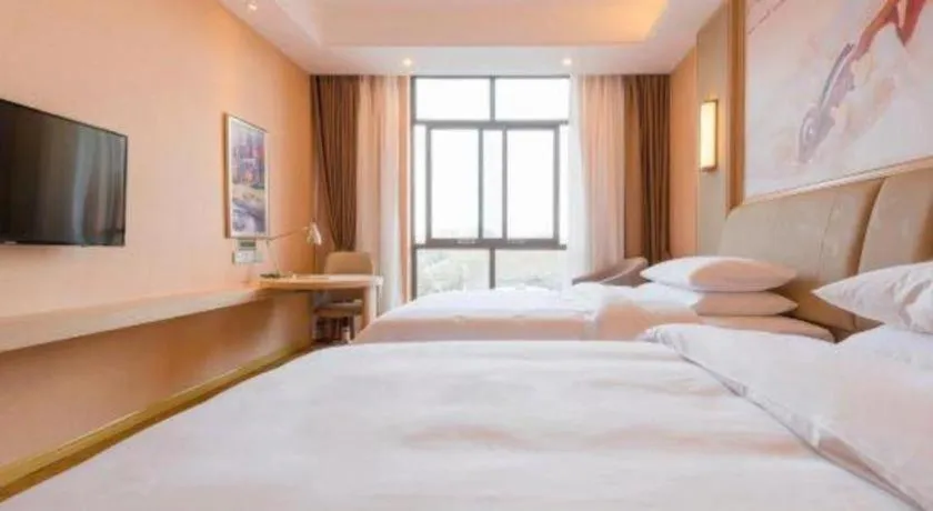 Bed in Vienna Hotel Chongqing Jiangjin Shuangfu