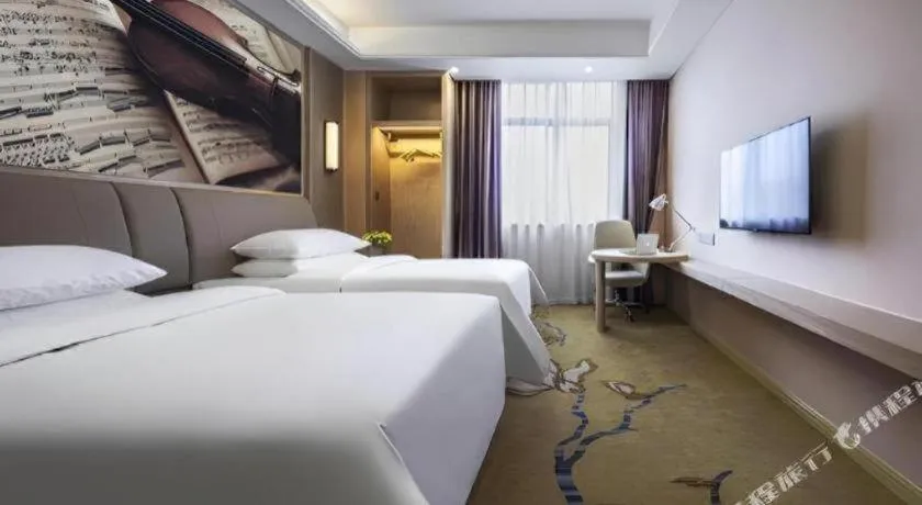 Bed in Vienna Hotel Chongqing Jiangjin Shuangfu