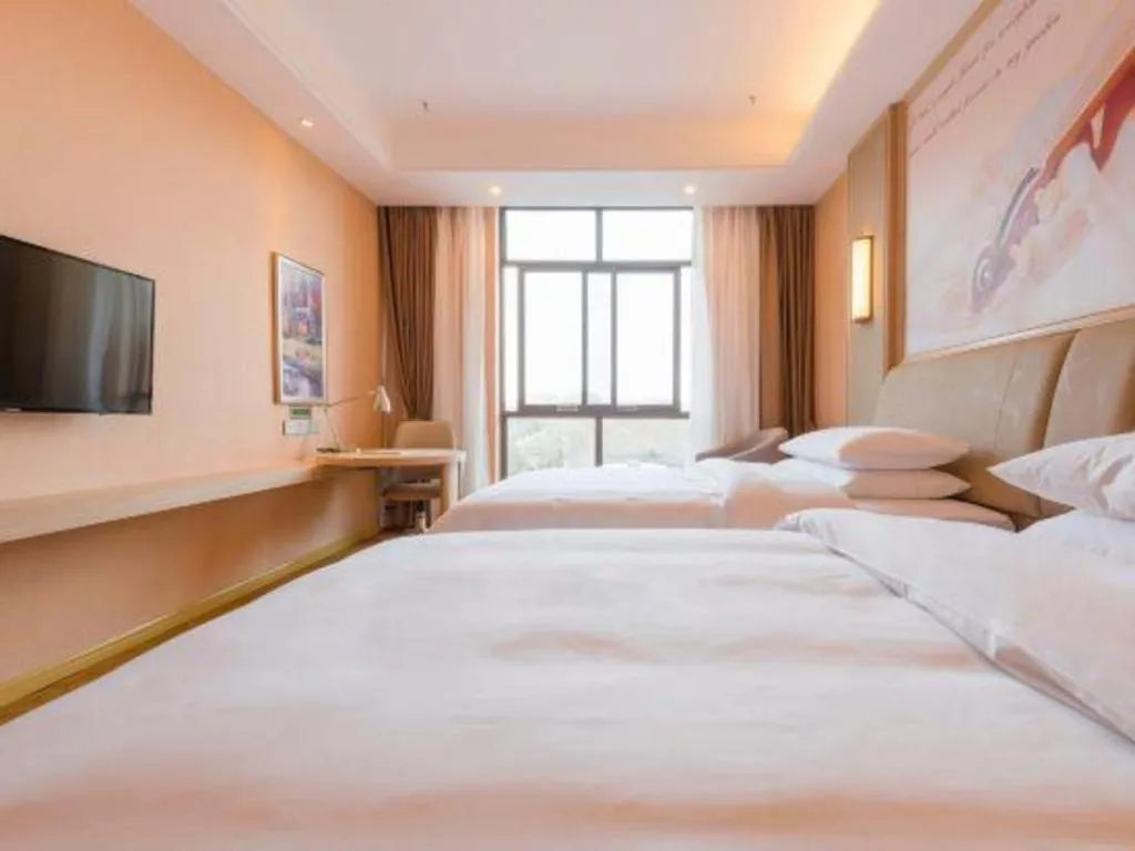 Bed in Vienna Hotel Chongqing Jiangjin Shuangfu