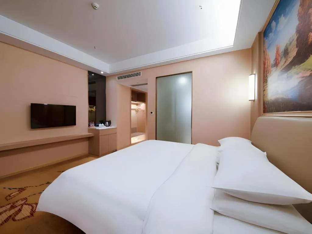 Bed in Vienna Hotel Chongqing Jiangjin Shuangfu