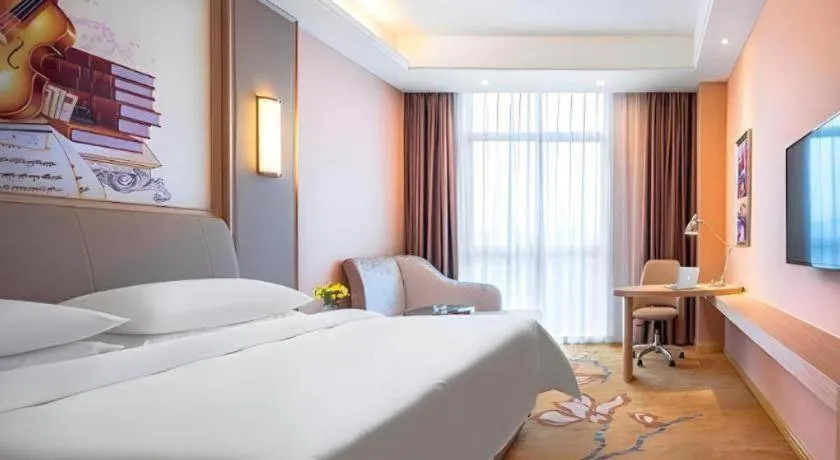 Bed in Vienna Hotel Chongqing Jiangjin Shuangfu