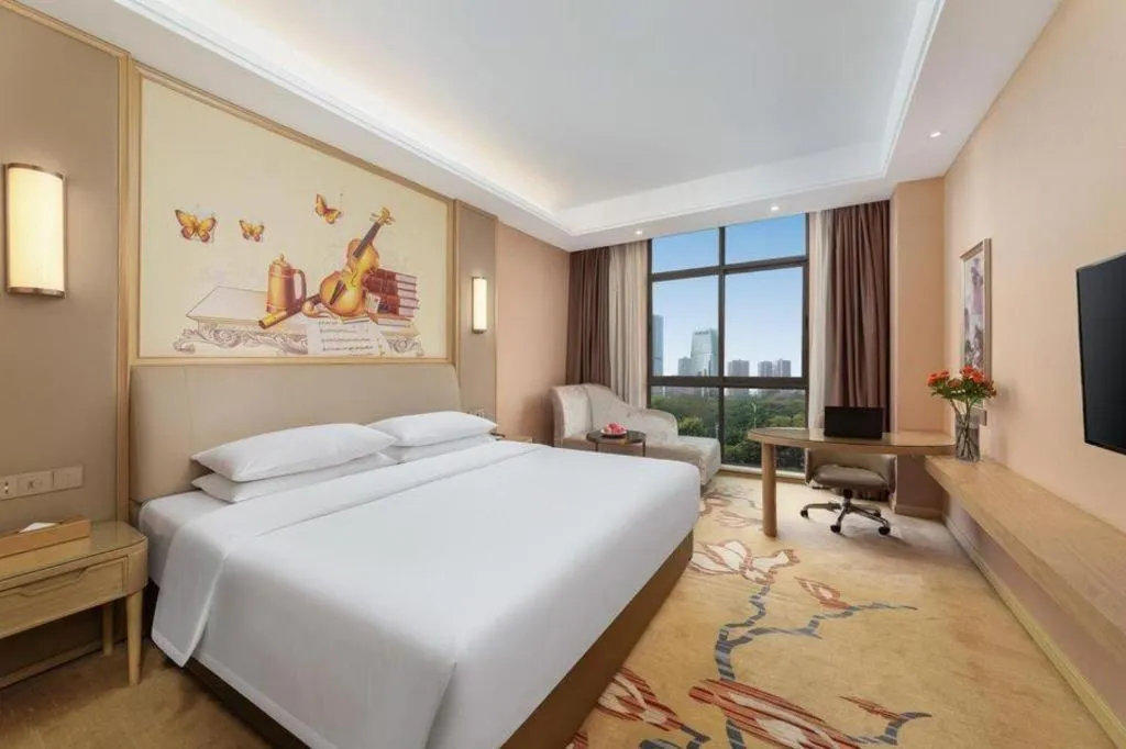 Bed in Vienna Hotel Chongqing Jiangjin Shuangfu