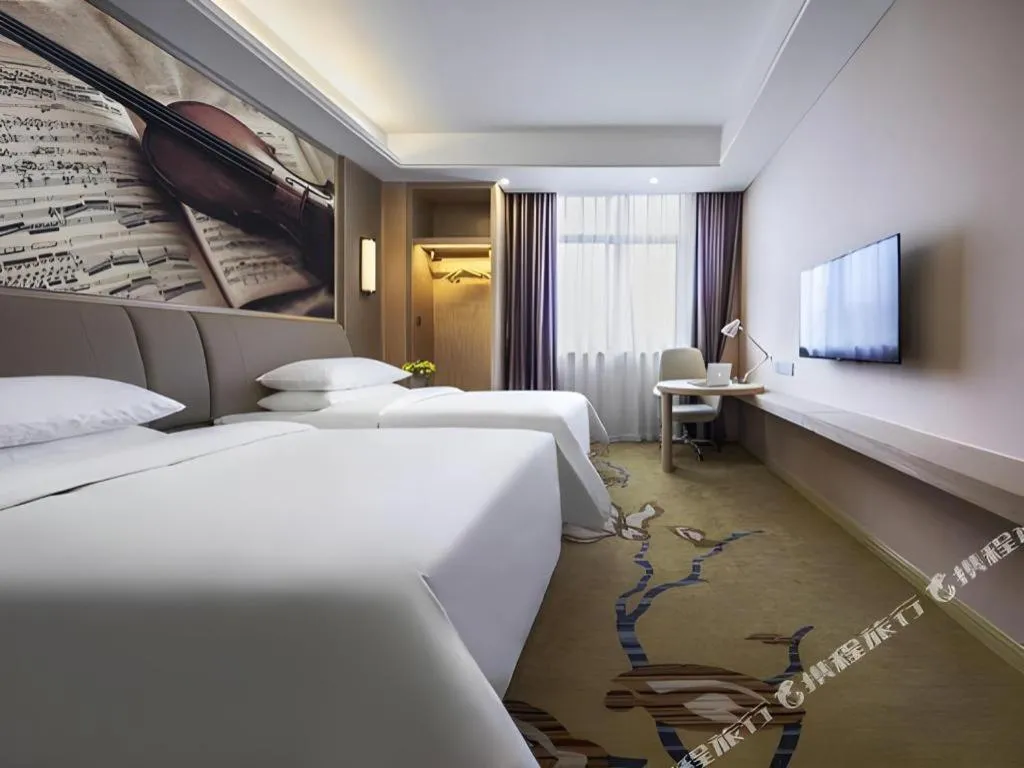 Bed in Vienna Hotel Chongqing Jiangjin Shuangfu