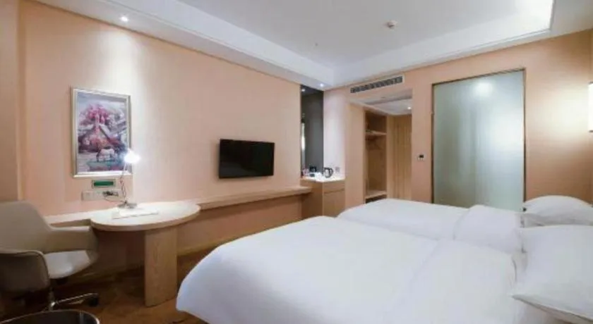 Bed in Vienna Hotel Chongqing Jiangjin Shuangfu