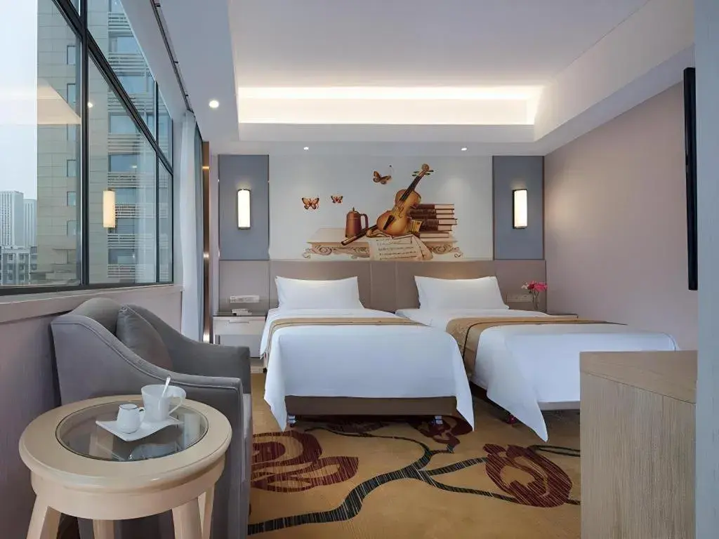 Bed in Vienna Hotel Chongqing Shiqiaopu Metro Station Bed in Vienna Hotel Chongqing Shiqiaopu Metro Station