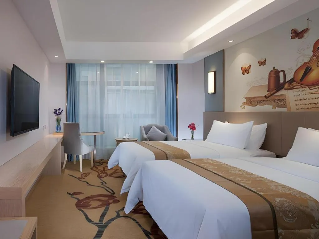 Bed in Vienna Hotel Chongqing Shiqiaopu Metro Station