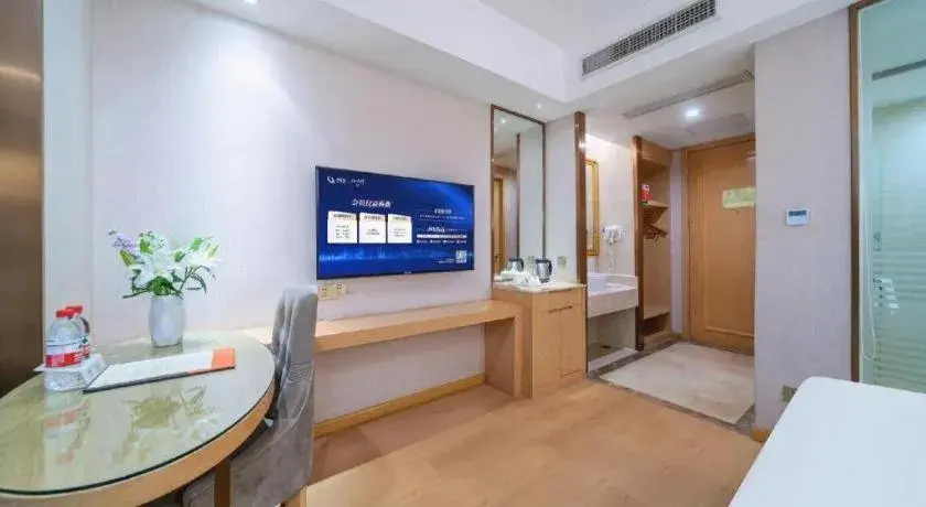 Bed in Vienna Hotel Chongqing Shiqiaopu Metro Station Bed in Vienna Hotel Chongqing Shiqiaopu Metro Station