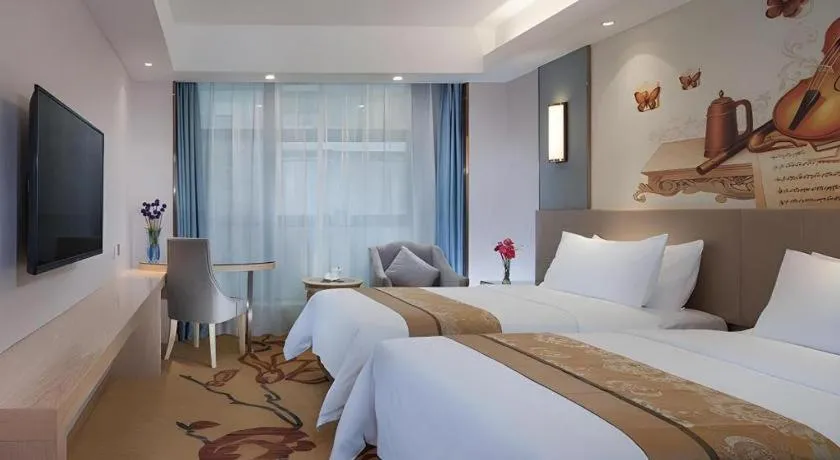 Bed in Vienna Hotel Chongqing Shiqiaopu Metro Station