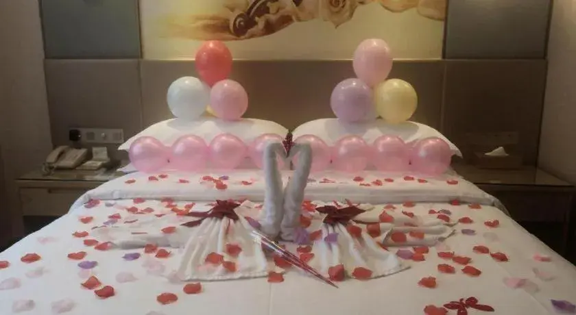 Bed in Vienna Hotel Chongqing Shiqiaopu Metro Station Bed in Vienna Hotel Chongqing Shiqiaopu Metro Station