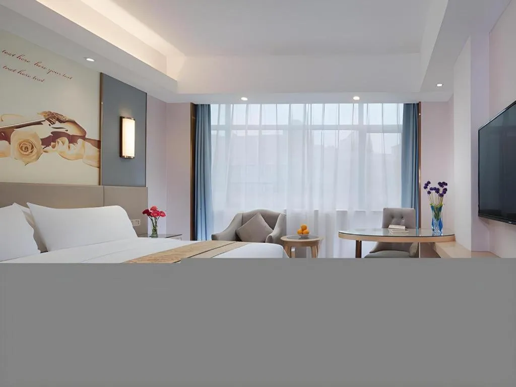 Bed in Vienna Hotel Chongqing Shiqiaopu Metro Station