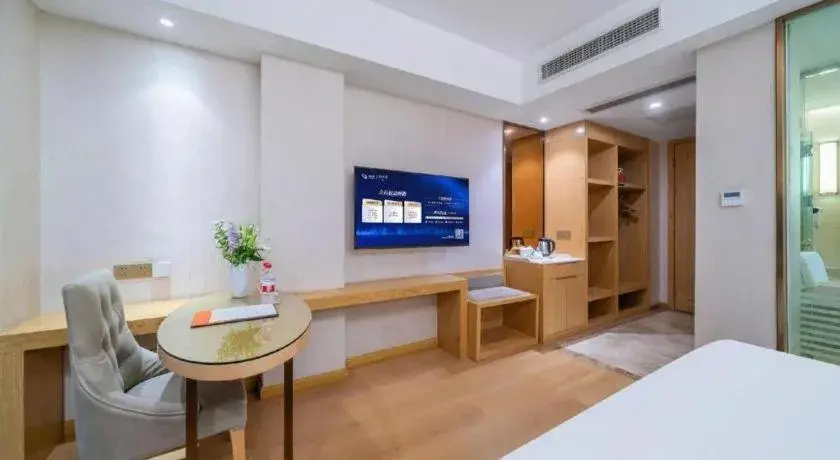 Bed in Vienna Hotel Chongqing Shiqiaopu Metro Station Bed in Vienna Hotel Chongqing Shiqiaopu Metro Station