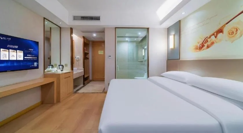 Bed in Vienna Hotel Chongqing Shiqiaopu Metro Station