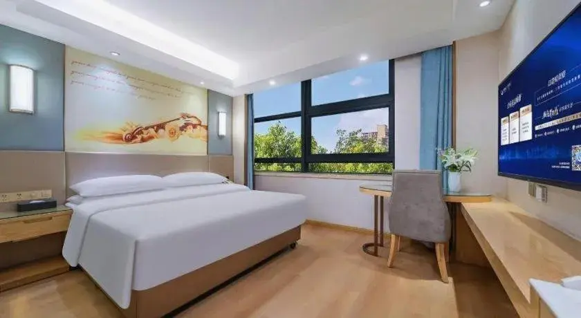 Bed in Vienna Hotel Chongqing Shiqiaopu Metro Station Bed in Vienna Hotel Chongqing Shiqiaopu Metro Station