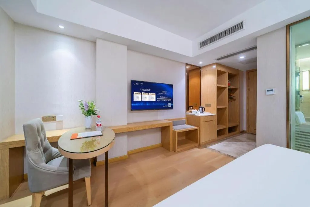 Bed in Vienna Hotel Chongqing Shiqiaopu Metro Station