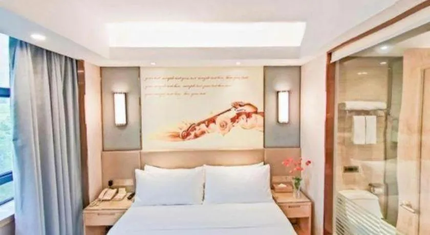 Bed in Vienna Hotel Chongqing Shiqiaopu Metro Station