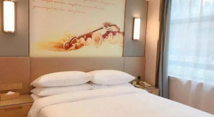 Bed in Vienna Hotel Chongqing Shiqiaopu Metro Station