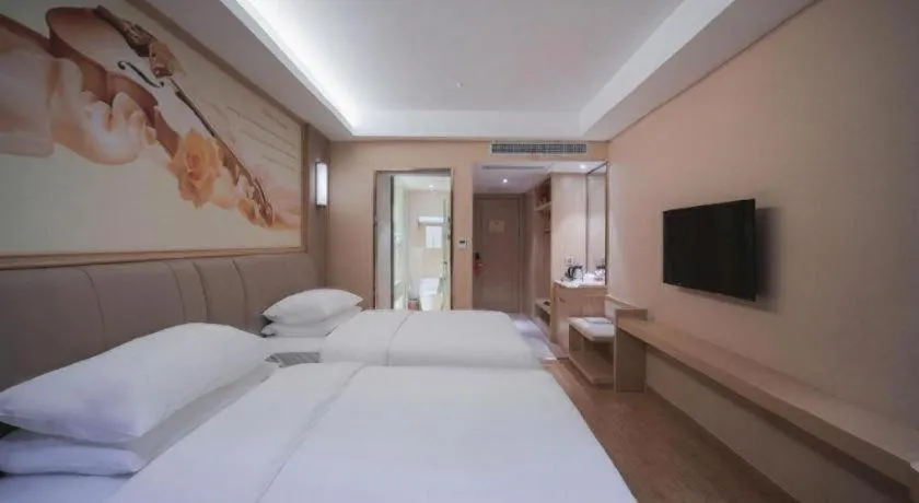 Bed in Vienna Hotel Chongqing Yangjiaping Pedestrian Street Light Railway Station