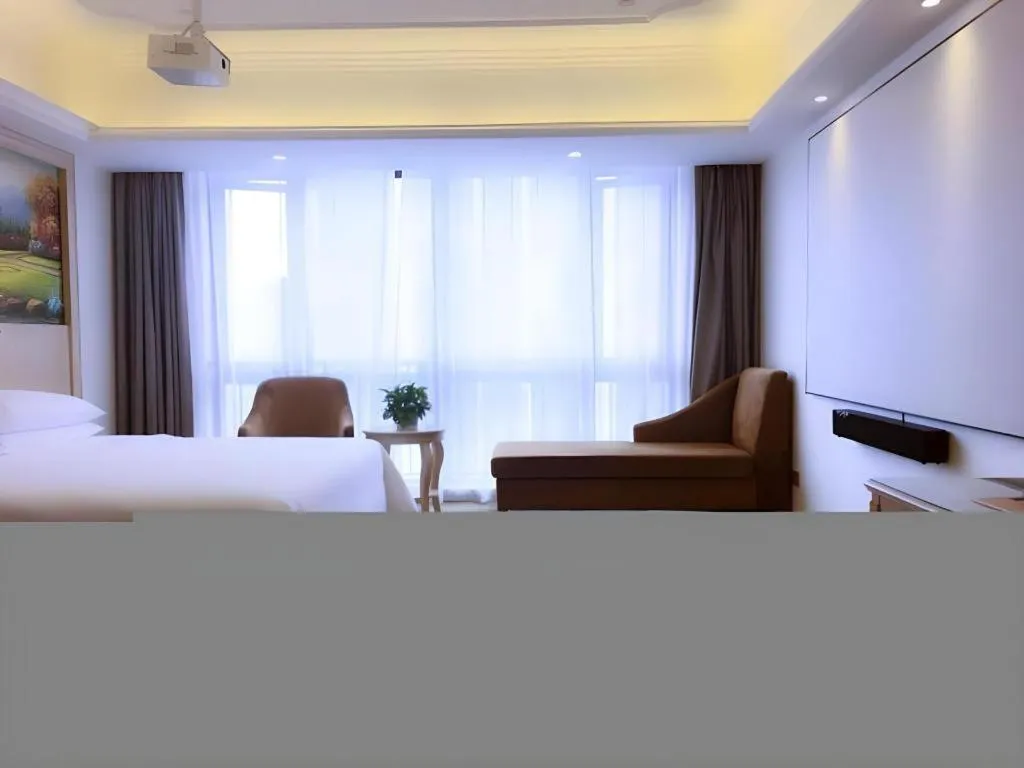 Bed in Vienna Hotel Chongqing Yangjiaping Pedestrian Street Light Railway Station