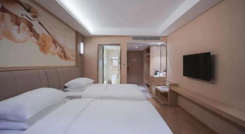 Bed in Vienna Hotel Chongqing Yangjiaping Pedestrian Street Light Railway Station
