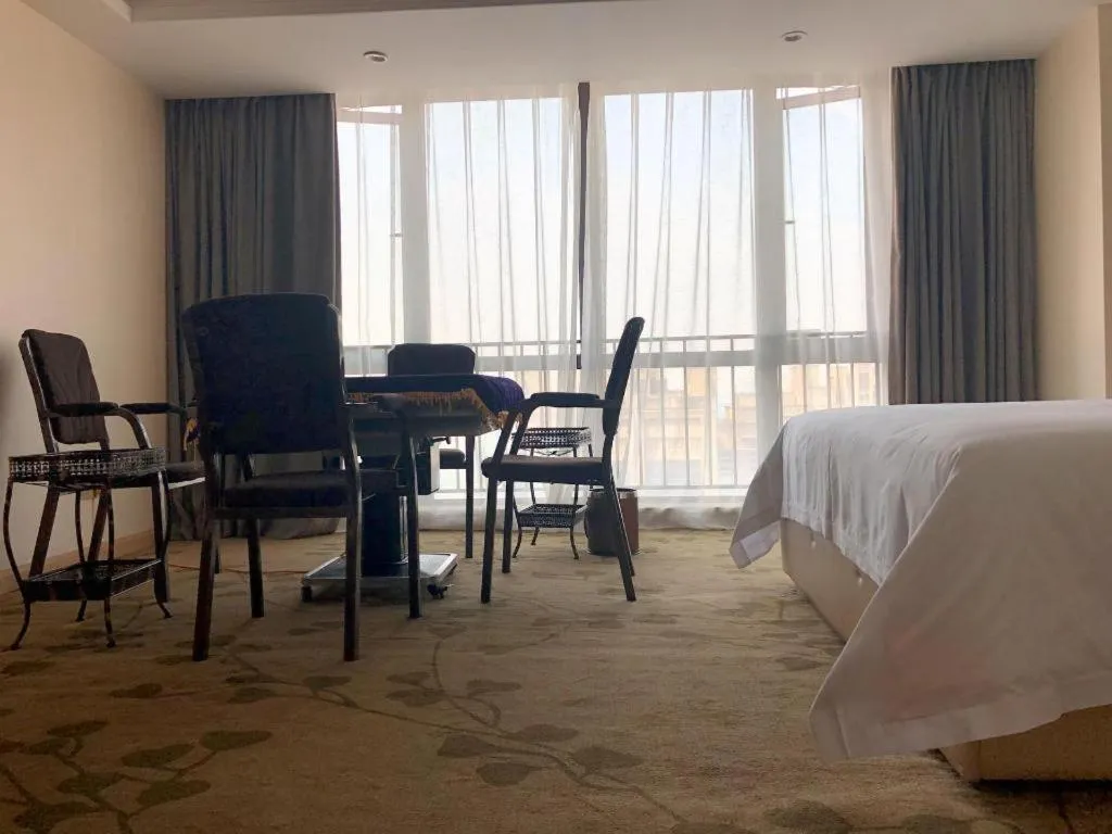 Bed in Vienna Hotel Chongqing Yangjiaping Pedestrian Street Light Railway Station