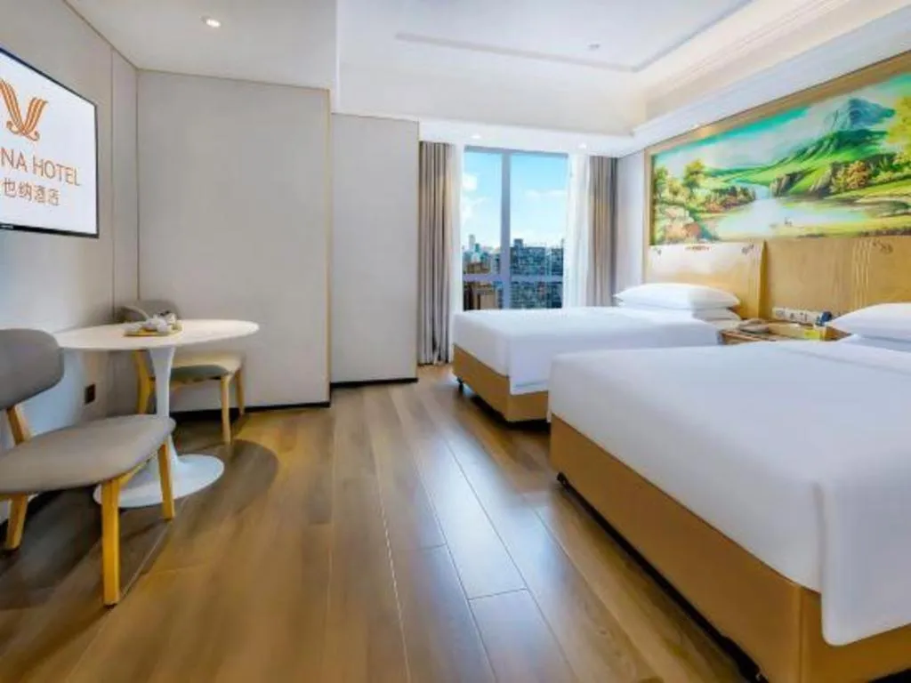 Bed in Vienna Hotel Chongqing Yangjiaping Pedestrian Street Light Railway Station