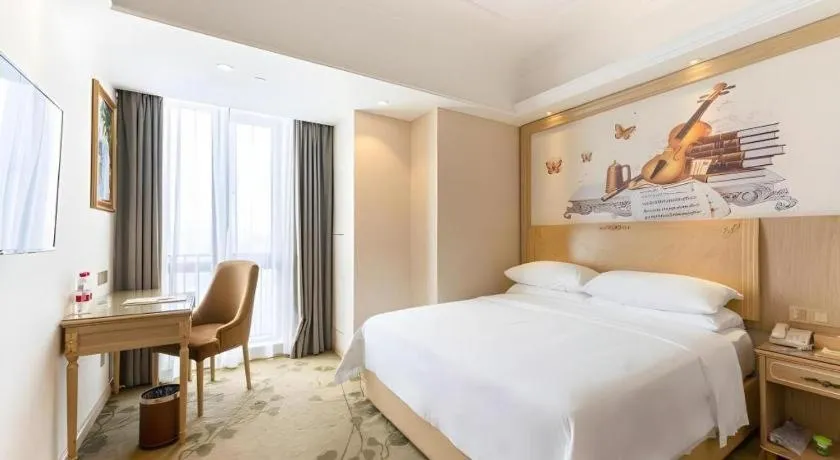 Bed in Vienna Hotel Chongqing Yangjiaping Pedestrian Street Light Railway Station