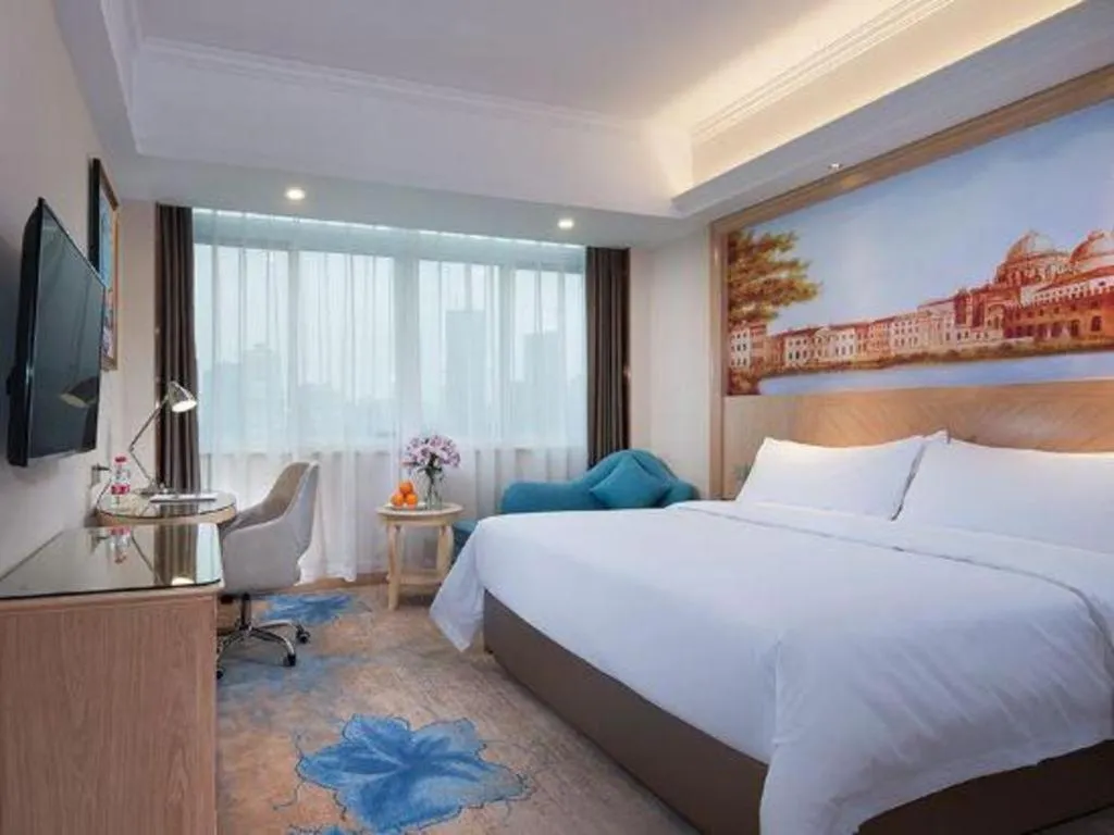 Bed in Vienna Hotel Chongqing Yangjiaping Pedestrian Street Light Railway Station