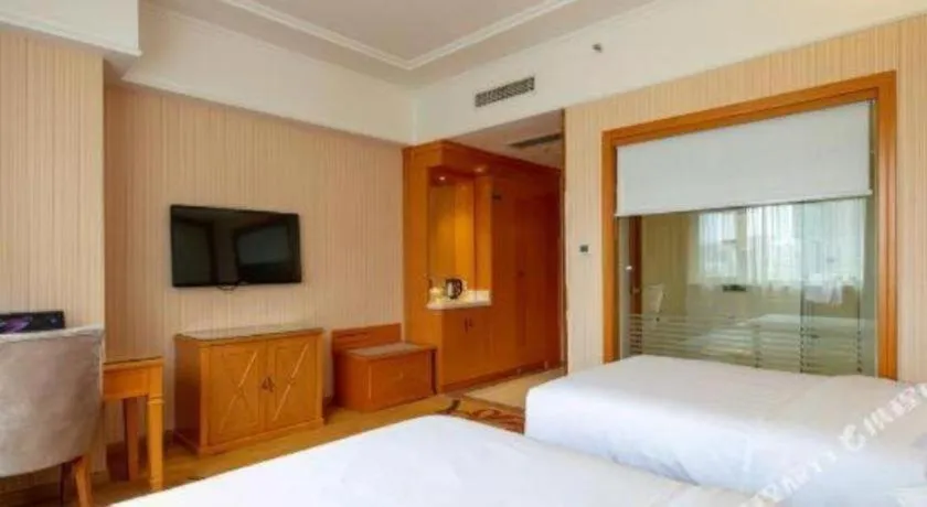 Bed in Vienna Hotel Xi'an Xijing Hospital Tonghuamen Metro Station