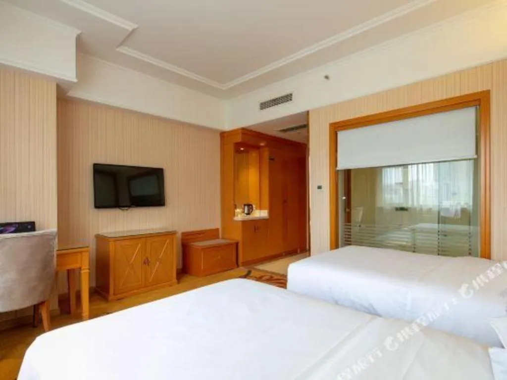 Bed in Vienna Hotel Xi'an Xijing Hospital Tonghuamen Metro Station