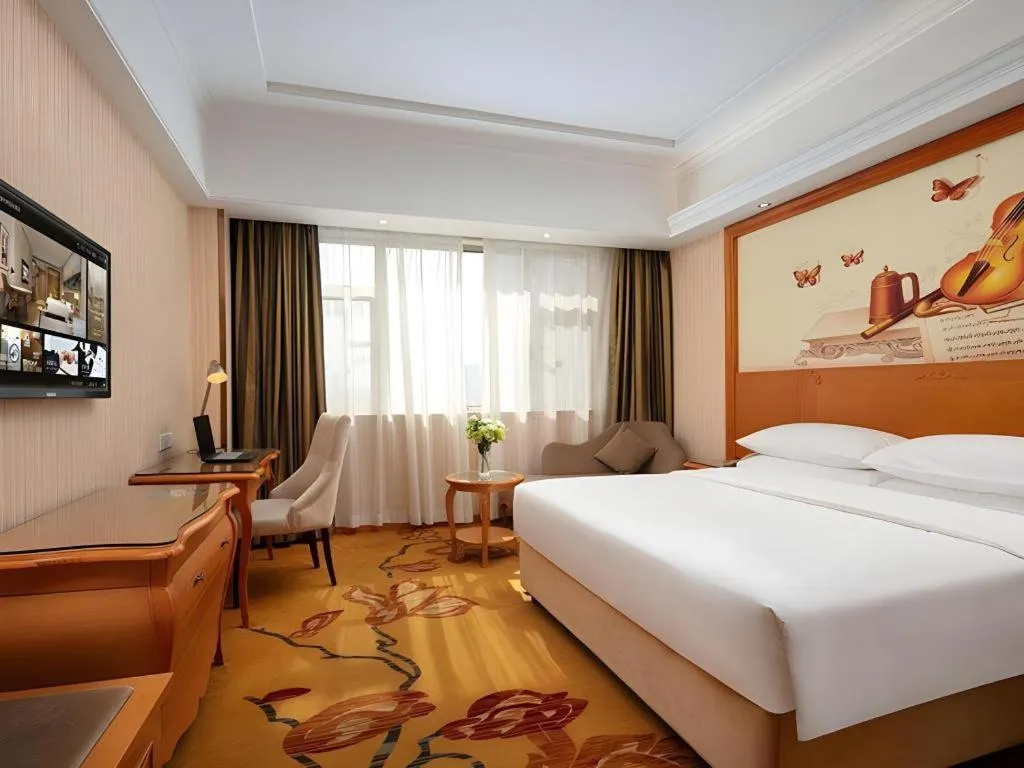 Bed in Vienna Hotel Xi'an Xijing Hospital Tonghuamen Metro Station