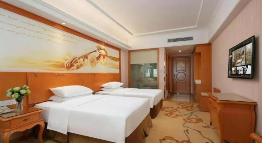 Bed in Vienna Hotel Xi'an Xijing Hospital Tonghuamen Metro Station