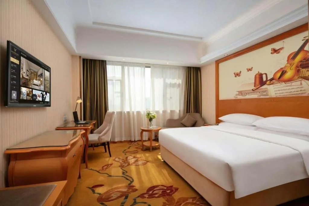 Bed in Vienna Hotel Xi'an Xijing Hospital Tonghuamen Metro Station