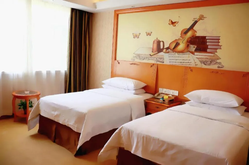 Bed in Vienna Hotel Xi'an Xijing Hospital Tonghuamen Metro Station