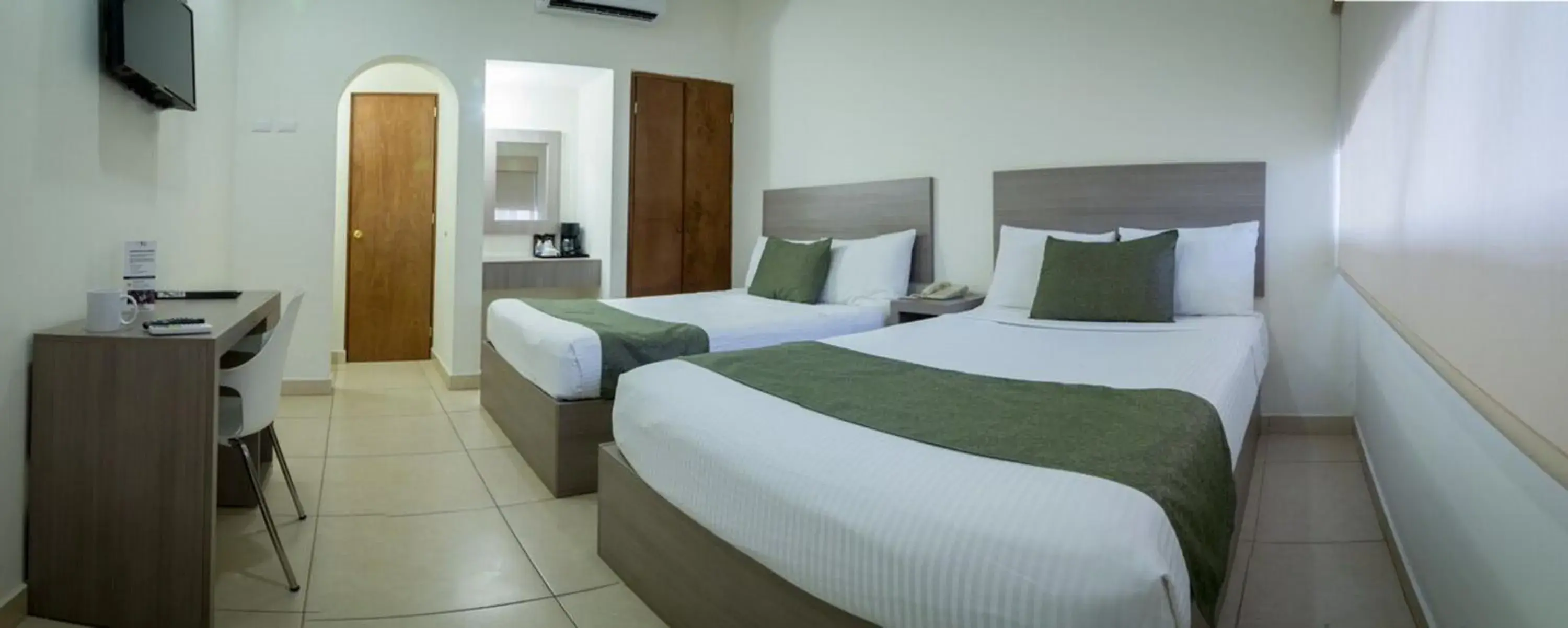 Bedroom in Hotel La Riviera Bedroom in Hotel La Riviera