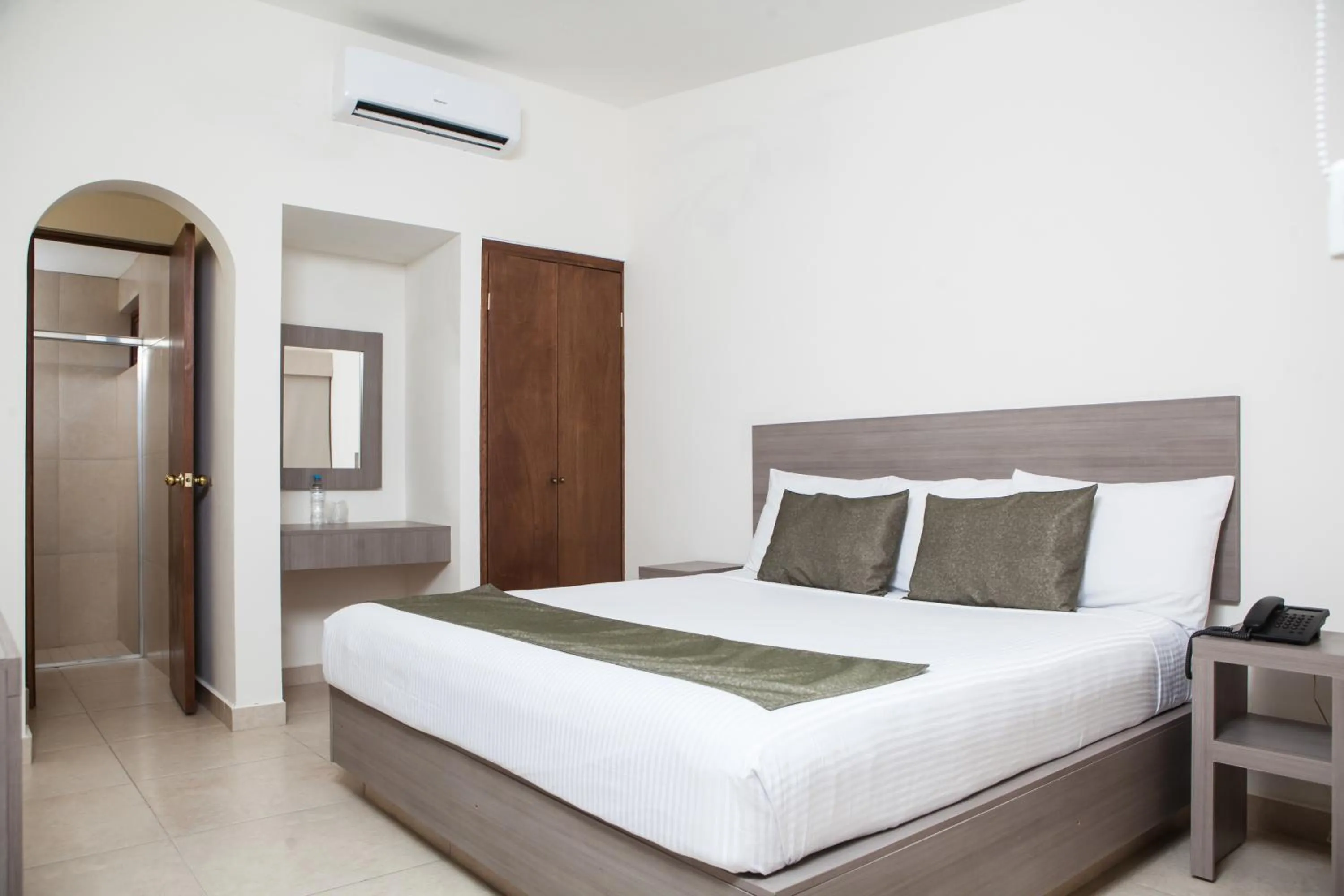 Bed in Hotel La Riviera