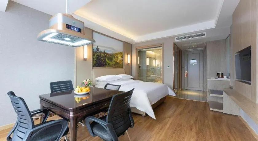 Bed in Vienna Hotel Jiangxi Fuzhou Yihuang